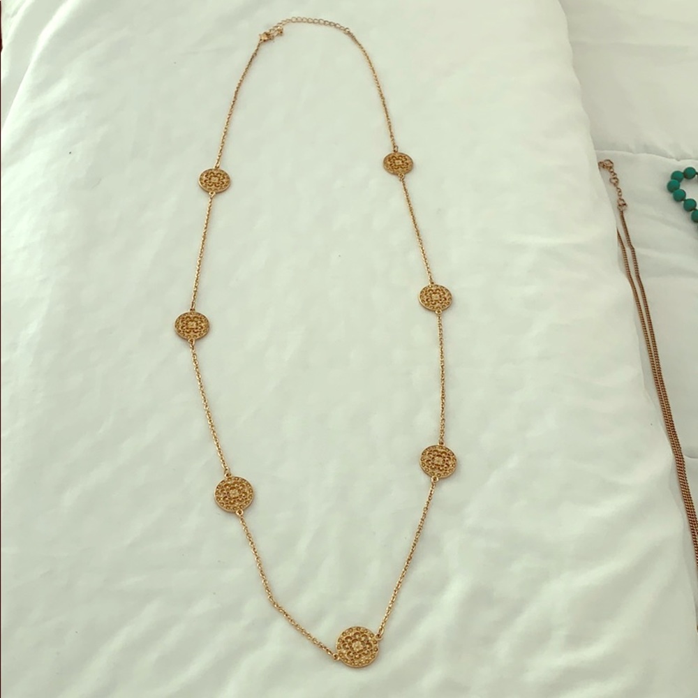 Long gold necklace